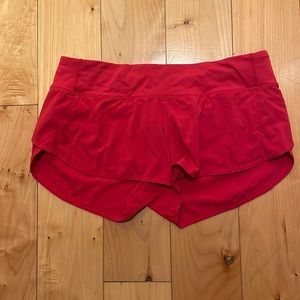 Women’s Lululemon red running shorts size 8